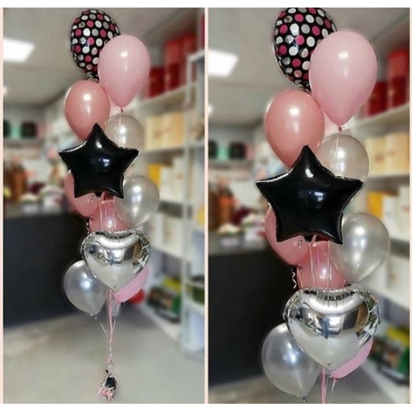 Водопад из шаров в розово-сербристо-черной гамме цветов.